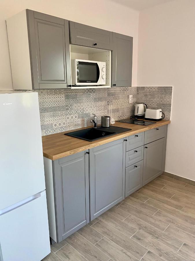 Pacsirta Apartman Grand Eger Bagian luar foto
